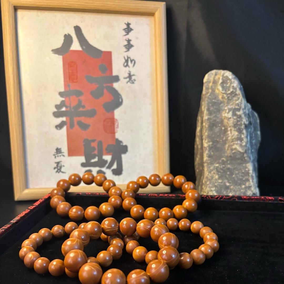 张氏橄榄核正圆光珠