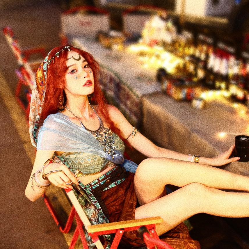 在版纳的摄影师关达