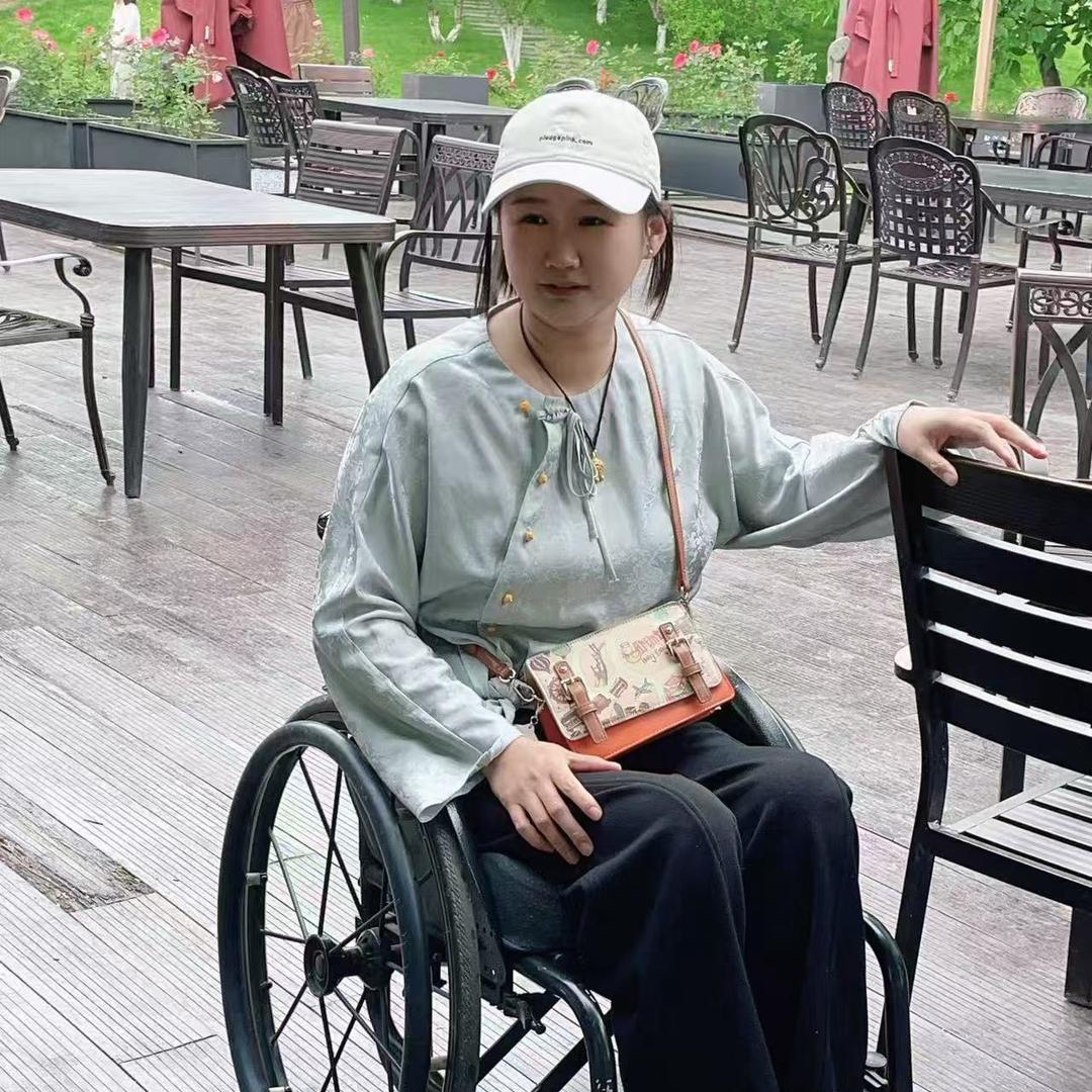 淑慧（轮椅上的妈妈）