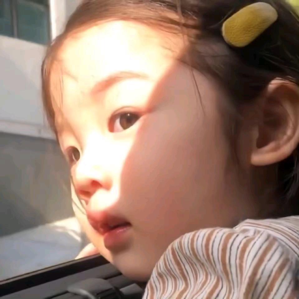 Zi .