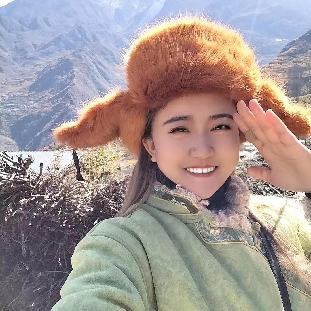 阿坝张德美，