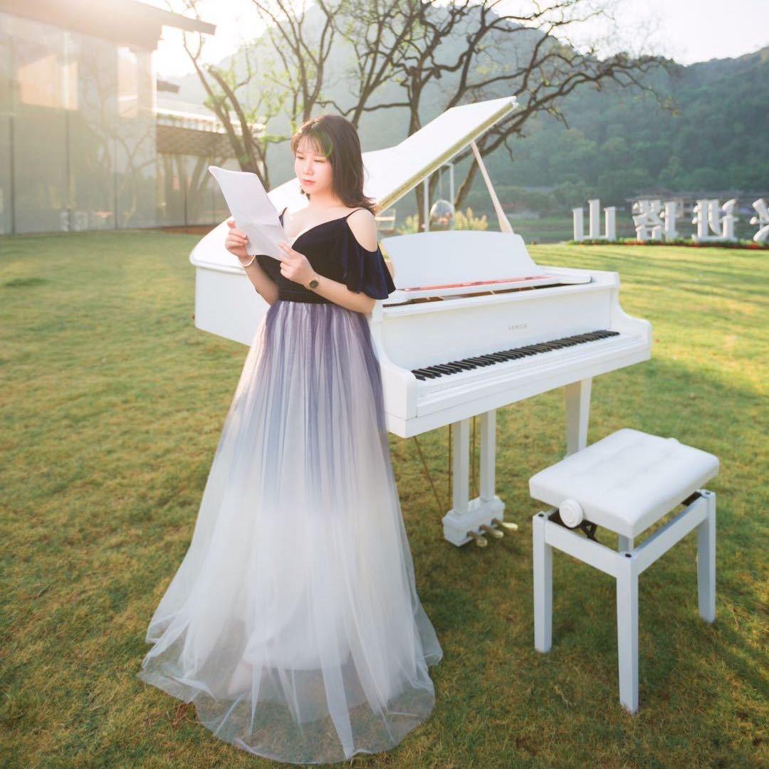 教钢琴的miss zhou