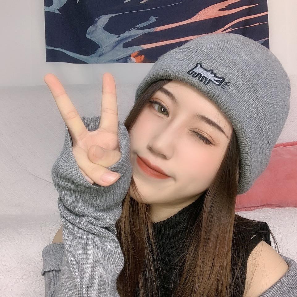 七七、