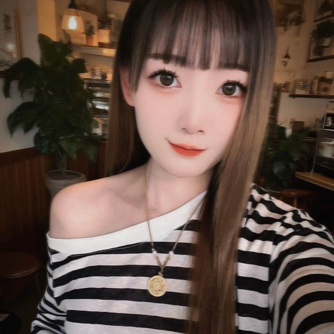 欣.