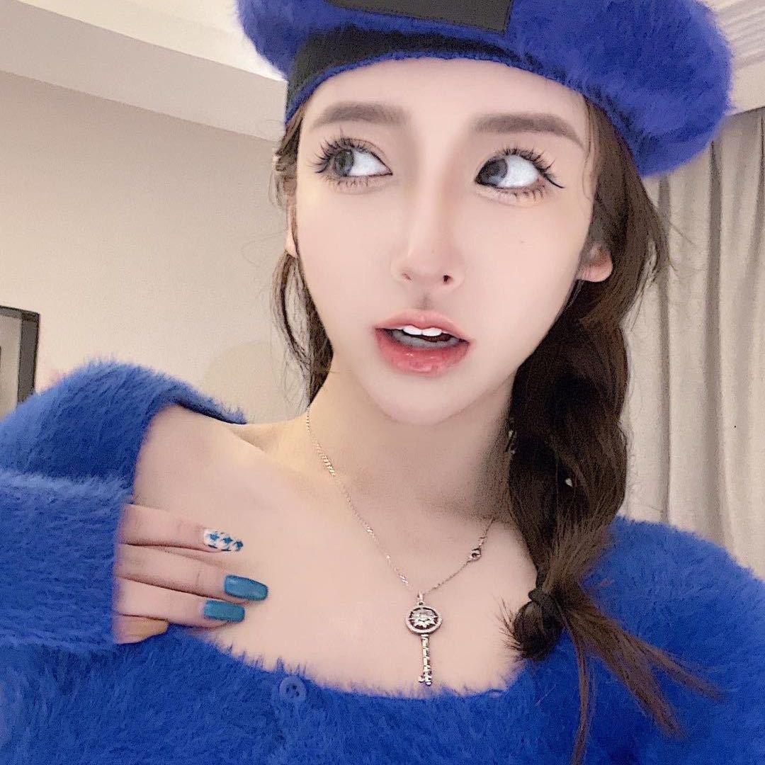 哦