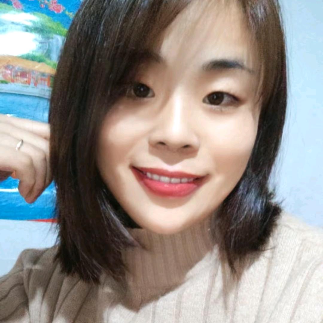 莞尔一笑