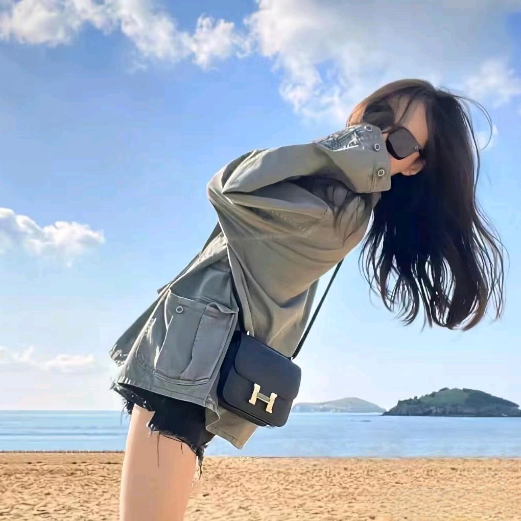 陳.