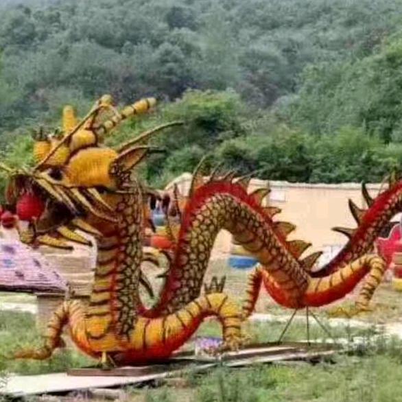 信阳农林谷稻草人仿真绿雕景观厂家